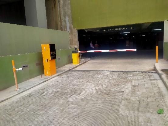 Parking exit with barrier gate at NU Star Cebu